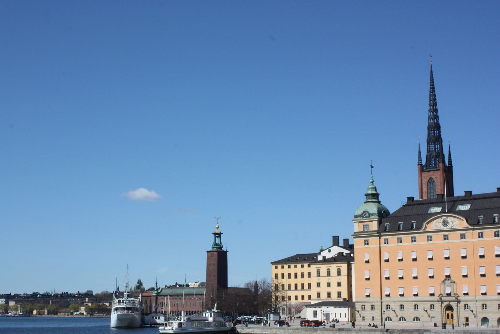 Riddarholmen church spire and Stockholm City Hall across the water, near the Stockholm cruise port quays